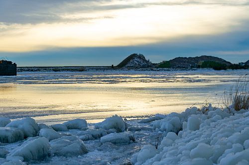 Setting sun on the ice surface