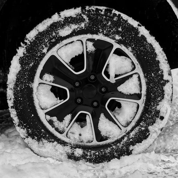 Tires in snow by Frank Heinz