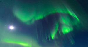 Aurora Northern Polar light in night sky over Northern Norway