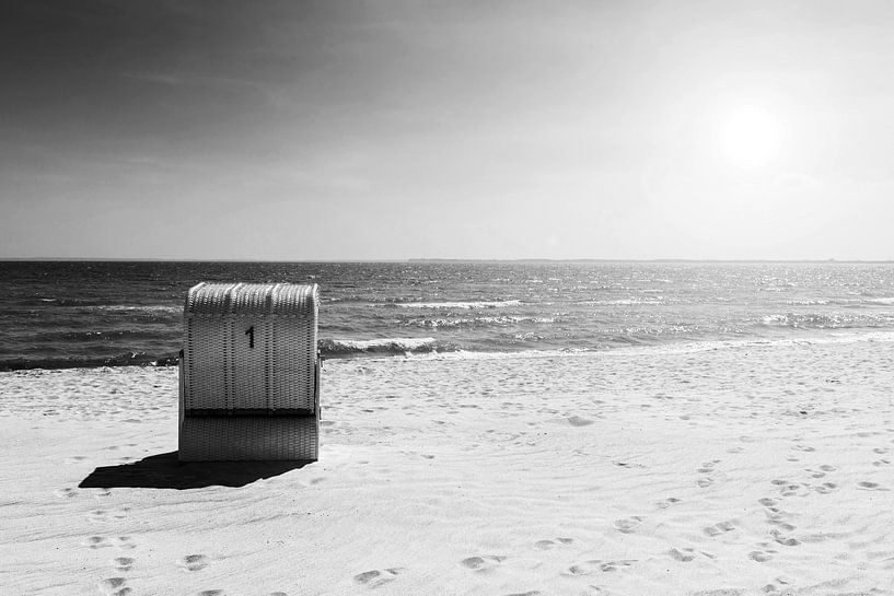 Beach chair in the sunset (black and white) by Frank Herrmann