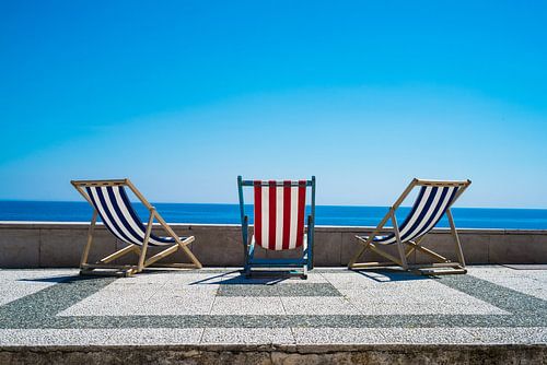 Beach chairs in the summer sun