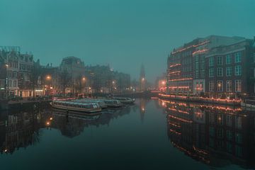 Amsterdam Canal in the Mist – Bridge with Warm Reflections