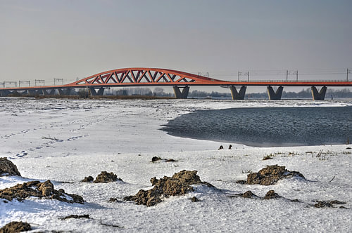 Red bridge in a white world