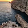 Zonsondergang bij de kliffen op Malta van Manon Verijdt