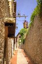 Eine malerische Straßenszene in Assisi von Berthold Werner Miniaturansicht