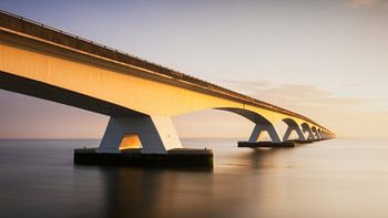 Connection in Golden Light: Zeeland Bridge in the Morning Sun