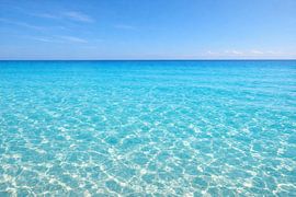 Türkisblaues Ozeanpanorama – Crystal Clear Ocean View von ButterflyPix