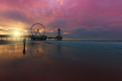 Beautiful autumn sunset at Scheveningen Pier by Rob Kints