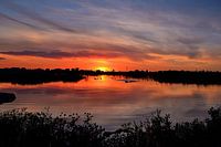 Zonsondergang boven water