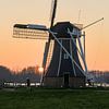 Moulin à vent au coucher du soleil sur Hannon Queiroz