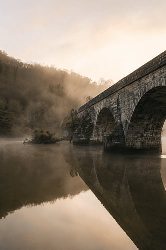 Whispers of the Bridge – Fine Art: A Misty River Bridge at Sunrise