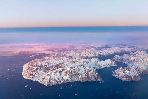 Greenland from the air – Arctic landscape bathed in pastel light