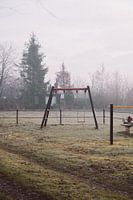 Swing set in the morning mist