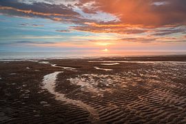 Dutch coast with sunset by Björn van den Berg