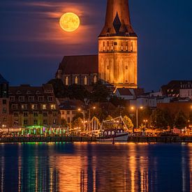 Twilight moon over the Petrikirche in Rostock by Patrick Schwarzbach