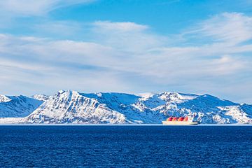 Mountains, rocks and ships in winter near Hammerfest in Norway by Rico Ködder