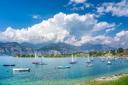 Sailboats in Val di Sogno bay at Malcesine, Lake Garda