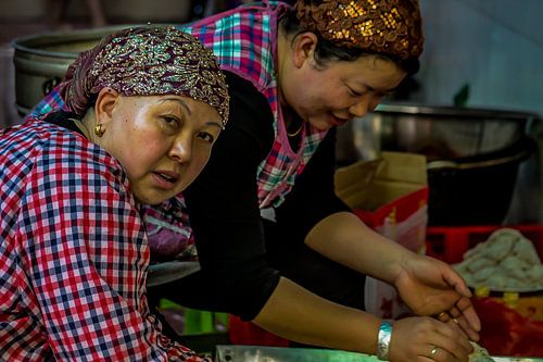 Vrouwen in het Moslim Kwartier in Xi'An