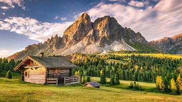 Alpine hut on a mountain pasture in the Alps / Dolomites in Italy