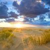 Sunset at the beach of Texel with sand dunes in the foreground by Sjoerd van der Wal