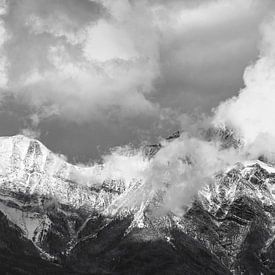 A beauty of snowy mountains and clouds by Jacqueline Heijt