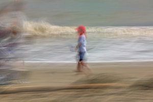 Little boy playing on the beach