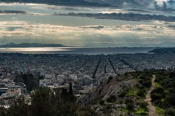 View over the skyline of Athens towards the sea van Werner Lerooy
