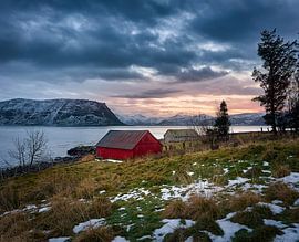 Winter landscape and sunset with two fishermen's huts on Godøy, Ålesund, Norway by qtx