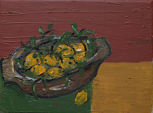 Wooden bowl with lemons