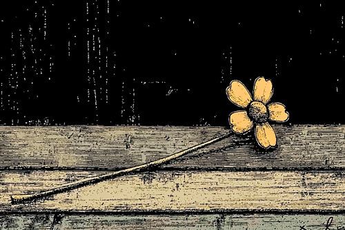 Fleur jaune sur fond de bois