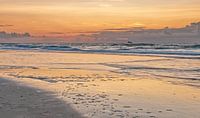 Zonsondergang aan zee