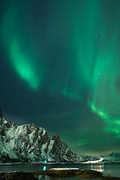 Aurora Borealis or northern lights over winter landscape print by Jürgen  Ritterbach