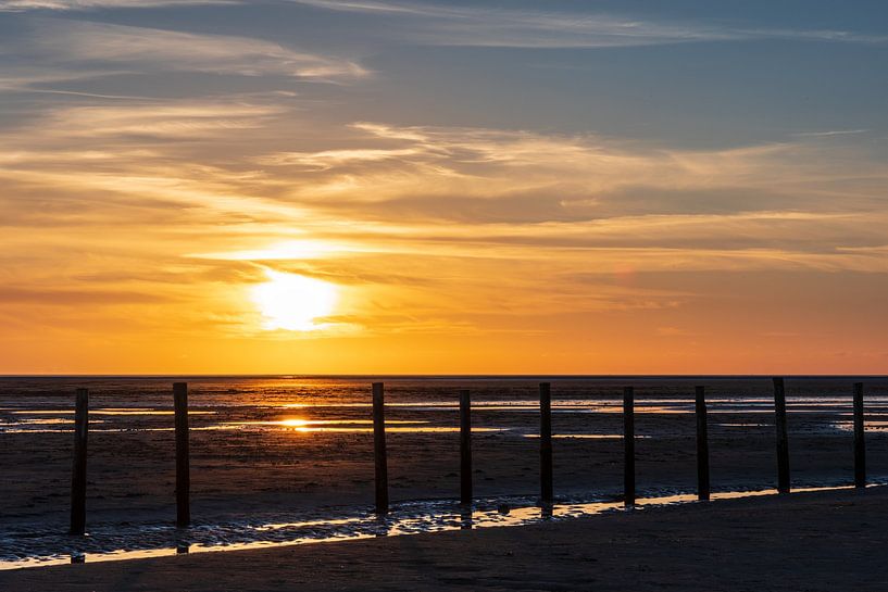 View through the pile boundary to the sunset by Annett Mirsberger