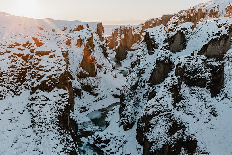 Fjaðrárgljúfur canyon covered in snow Iceland | travel photo art print by Elise van Gils