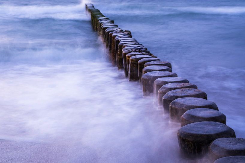 Groynes in the waves of the Baltic Sea by Tobias Luxberg