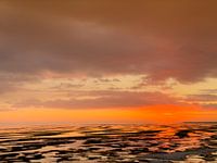 Ondergaande zon op de Wadden