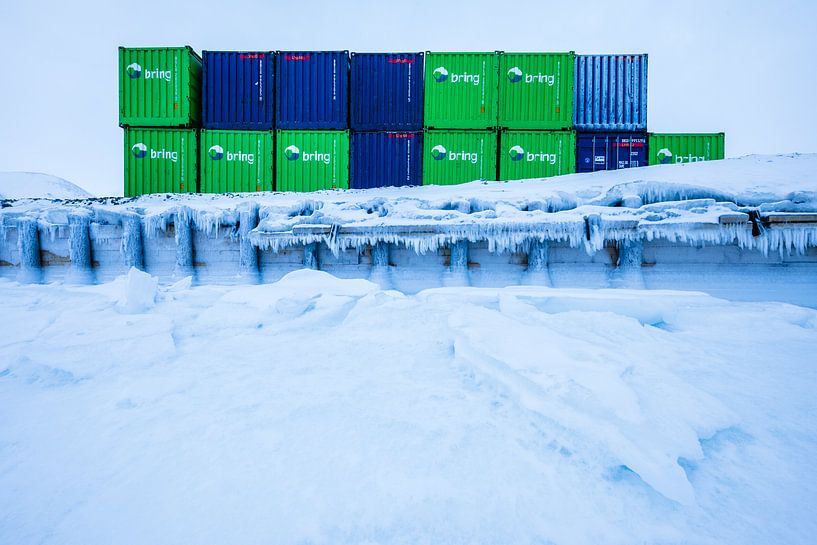 Blue-green containers in Longyearbyen by Martijn Smeets