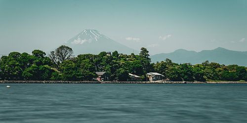 Culture meets nature: shrine by the sea in front of Mount Fuji