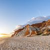 Sonnenuntergang am Sandstrand Praia da Falésia. Rote Klippen feiner Sand bei Albufeira, Portugal von Fotos by Jan Wehnert