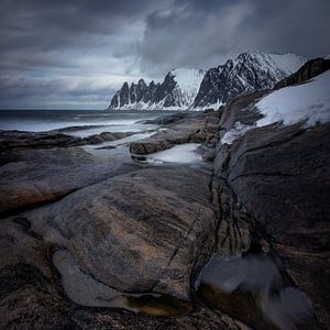 Tugeneset rocky coast with mountains in background, Norway