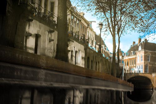 Reflection of canal houses in the water of the Oudegracht in Utrecht. One2expose Wout Kok Pho