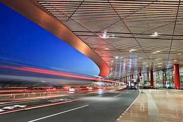 Beijing Capital International Airport at twilight by Tony Vingerhoets