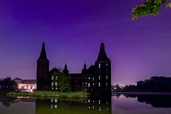 Le château de Hoensbroek dans une aurore boréale
