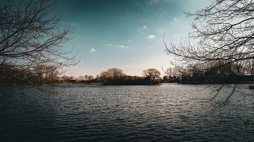 Beautiful Natural Landscape: A Deep Blue Sky and Still Waters of a Pristine Lake in Complete Harmony