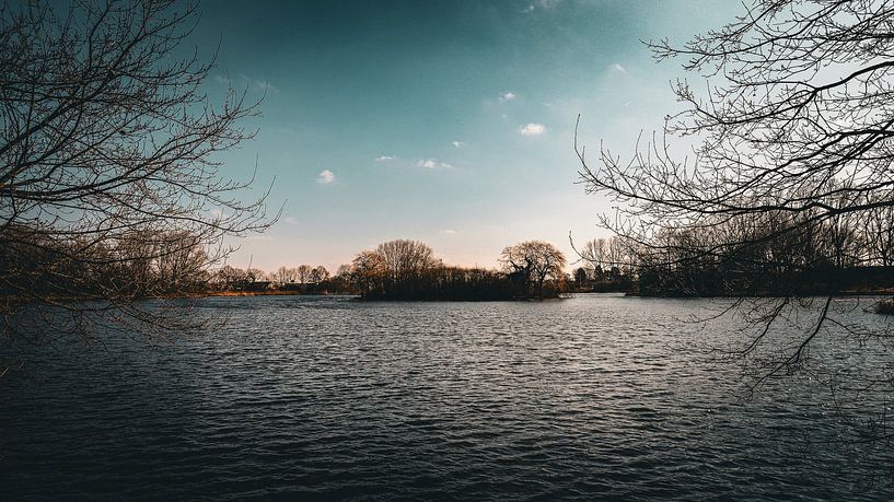 Beautiful Natural Landscape: A Deep Blue Sky and Still Waters of a Pristine Lake in Complete Harmony by ByLulu