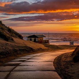 Sunset over the sea at beach exit Duinoord by Rob Baken