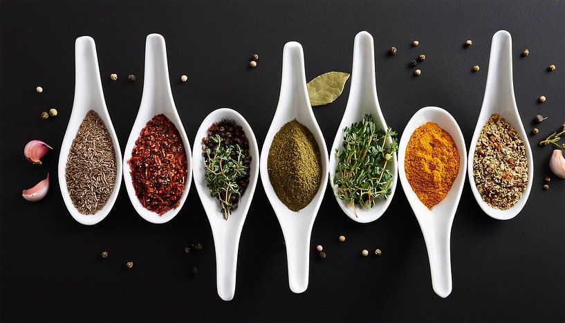 Various spices with black background by Mustafa Kurnaz