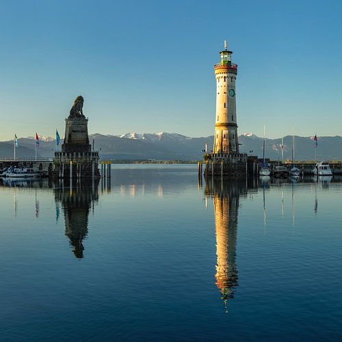 Lighthouse and Bavarian Lion in the harbour of Lindau at Lake Constance