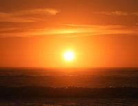 Rising sun in Moeraki, New Zealand