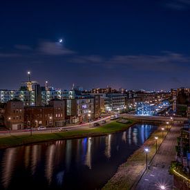 Des étoiles sur les moulins de Schiedam le jour de Noël sur Kok and Kok